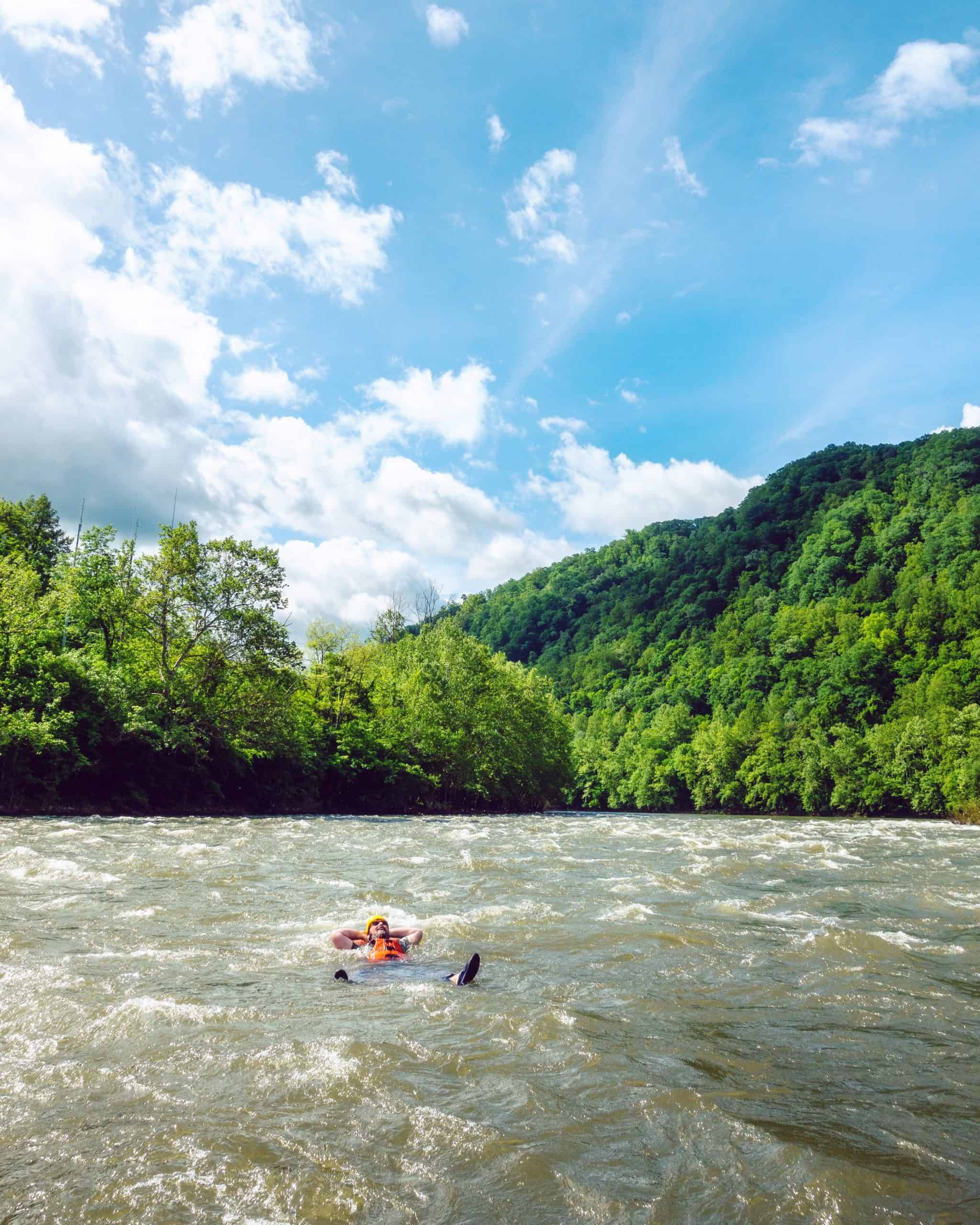 Barrett floating in the New River