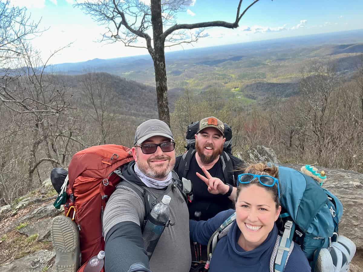 Cindy, Barrett and Quigley hiking