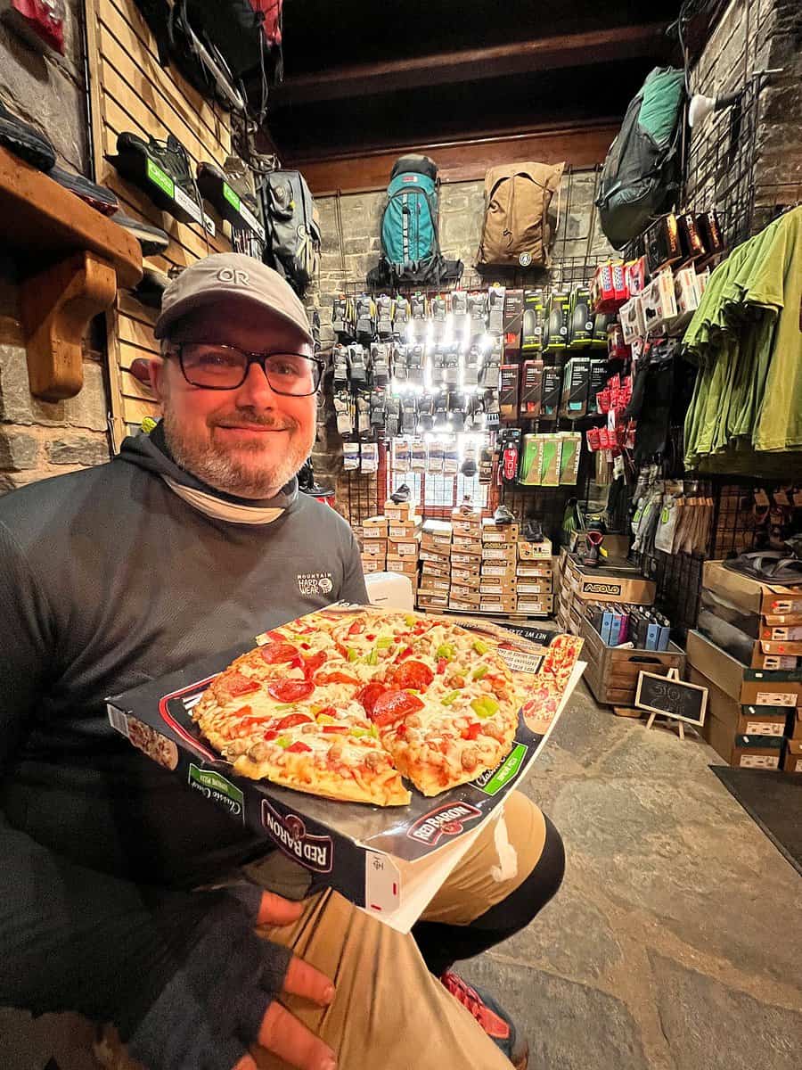 Barrett with pizza at Mountain Crossings