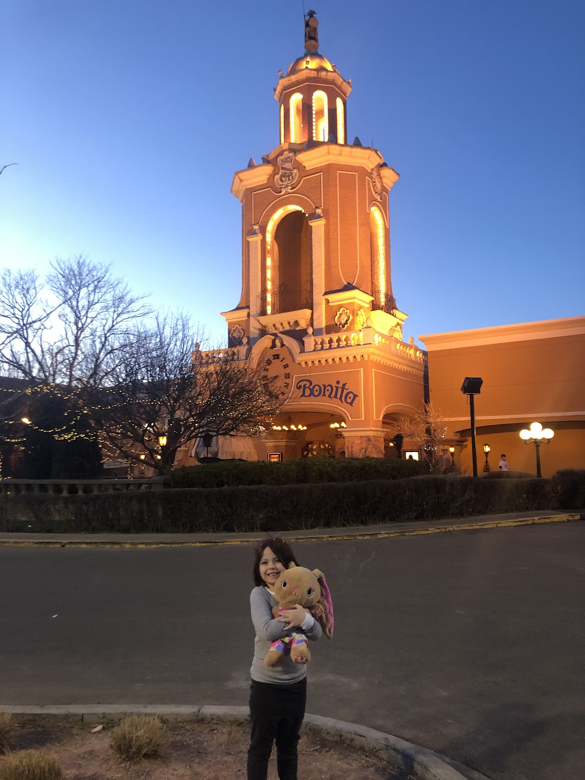 Kid in front of Casa Bonita