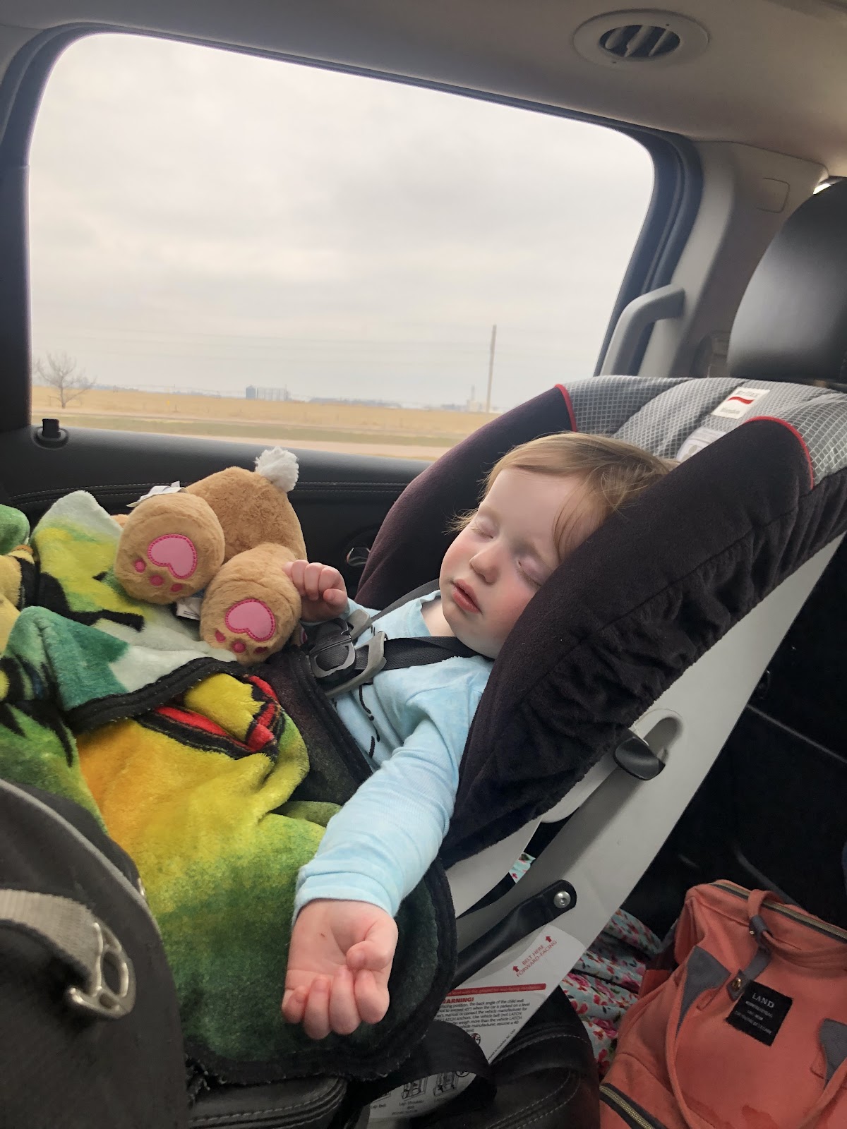 Tired kid on road trip