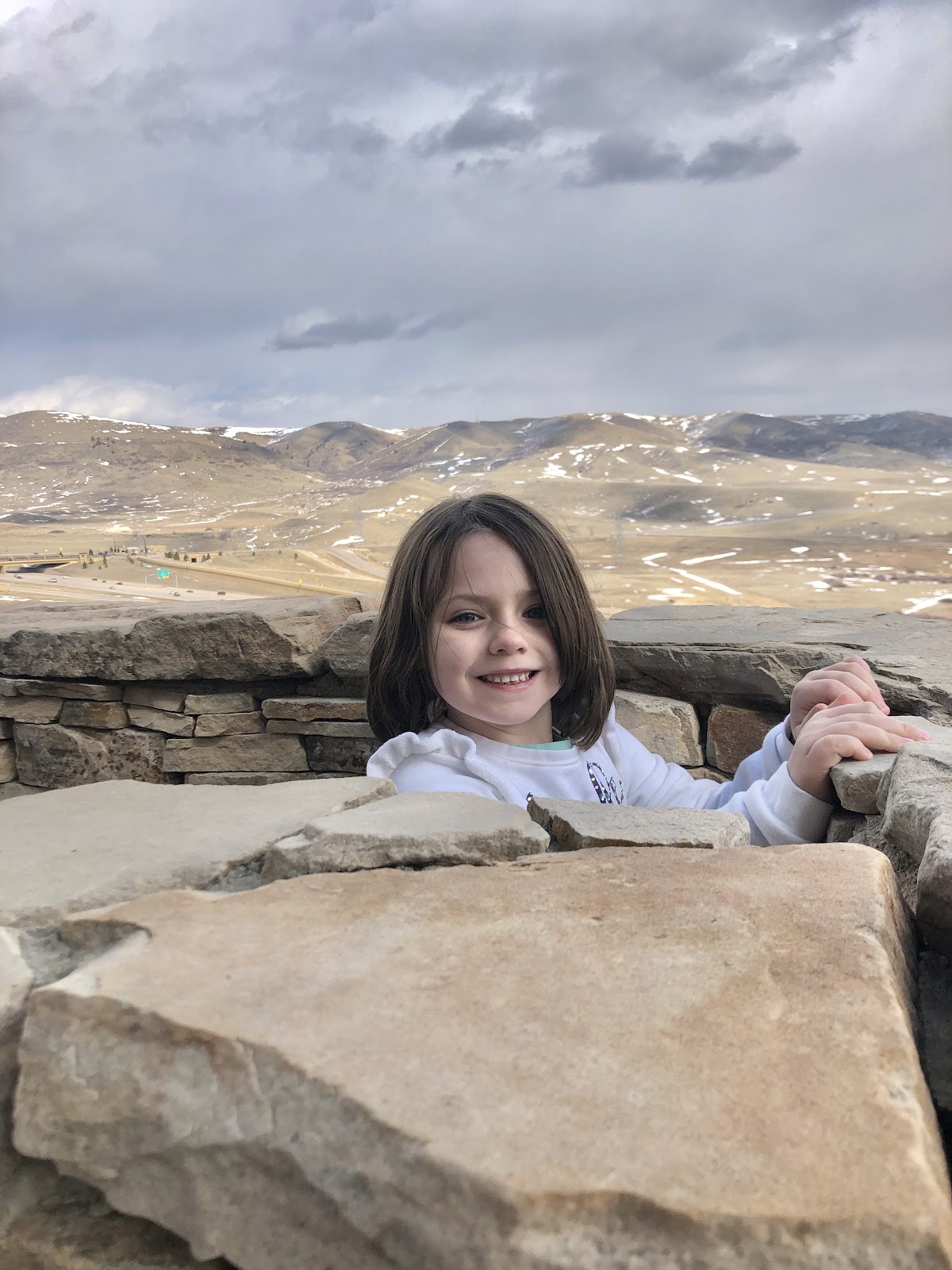 Kid at Dinosaur Ridge in Colorado