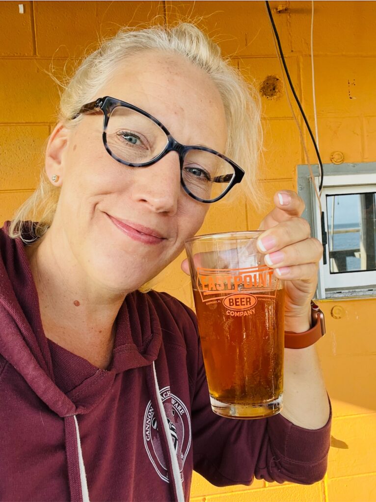 Heather at Eastpoint with a Beer along Florida's Forgotten Coast