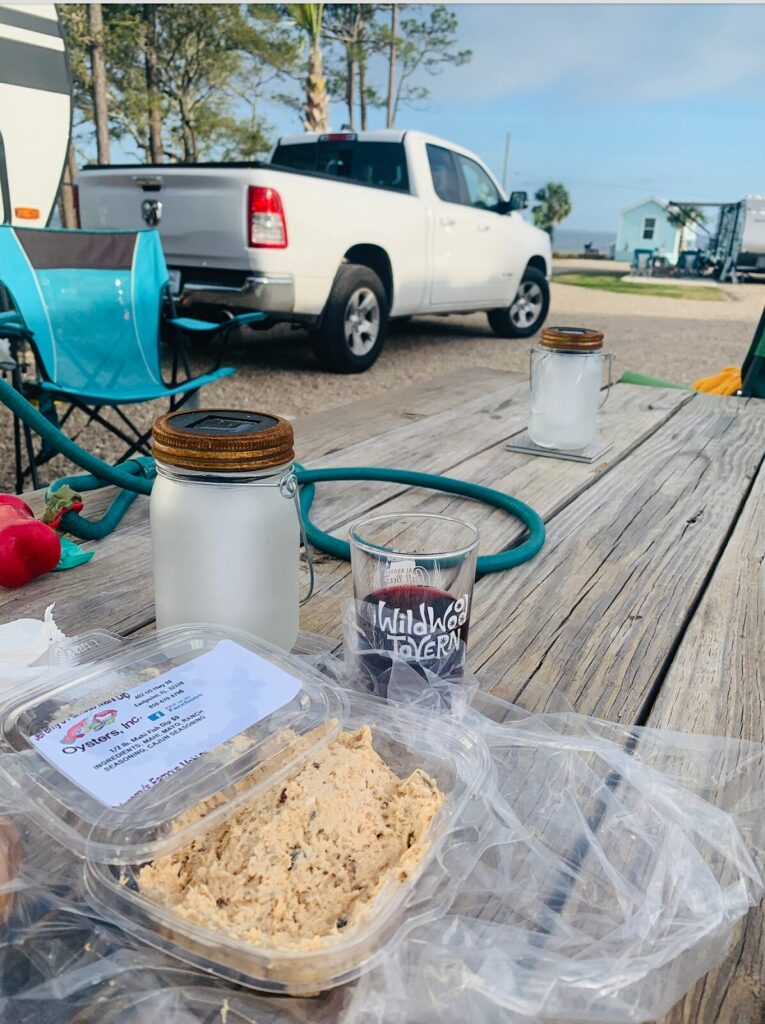 Heather enjoying fish dip at her RV parking spot in Florida's Forgotten Coast