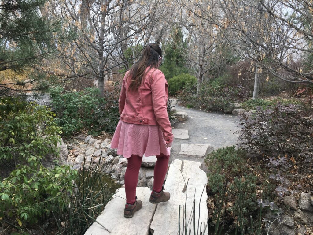 Jamie walking a trail at botanical garden in Albuquerque